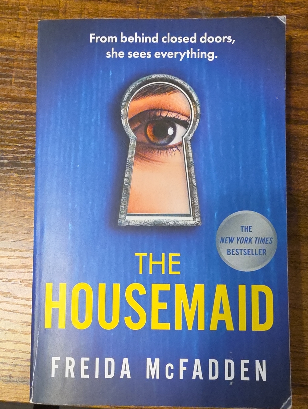 The Housemaid by - Blue Hardcover-Style Paperback